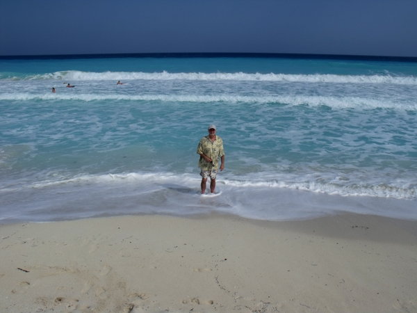 John wades in the Caribbean