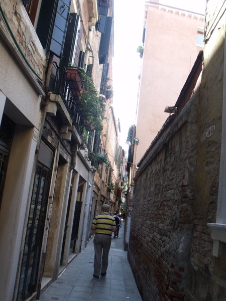 a narrow alley in Venice