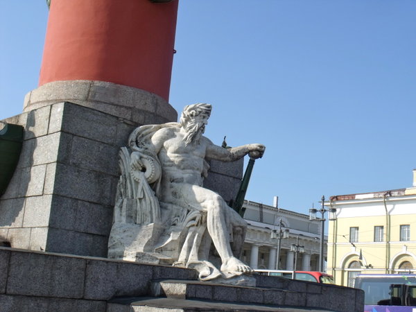 statue at the base of Rostral column