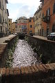 Lucca - the canal runs through the residential part of town