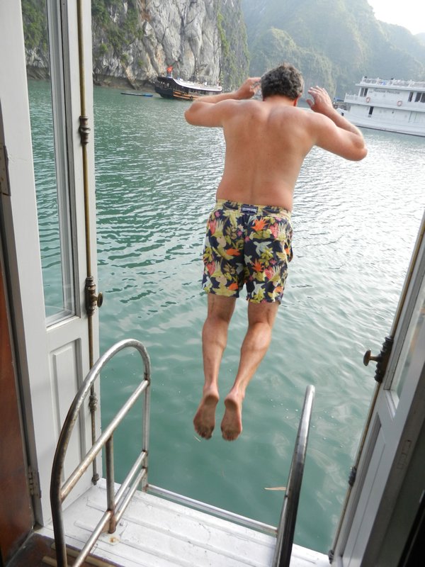 Arnaud takes a leap into the emerald waters