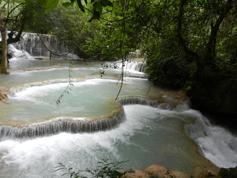 beautiful natural pools at the Kuang Si Falls