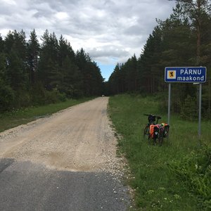 Entering into Parnu Vald ( county)  ; biking through forest