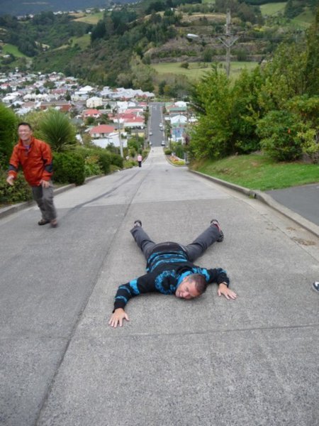 Collapsed after running up the steepest street in the world