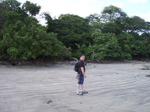 Ian walking on the beach