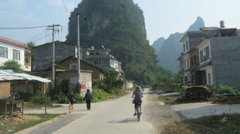 Cycling through a village