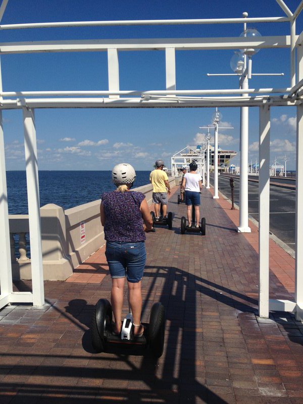 The tour group head along the pier