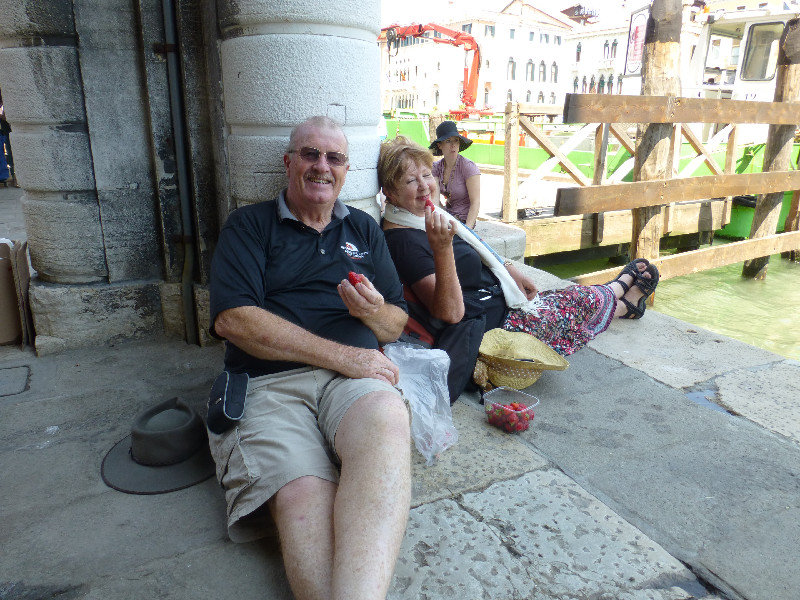 Enjoying our strawberries beside the Grand Canal.