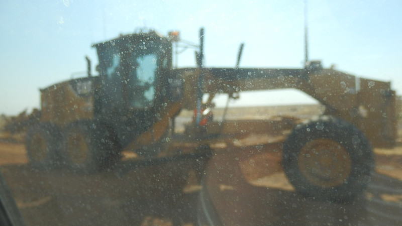 Passing the graders. Very dusty!