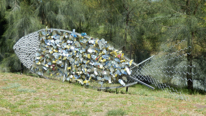 A big fish made out of recycled materials in the grounds