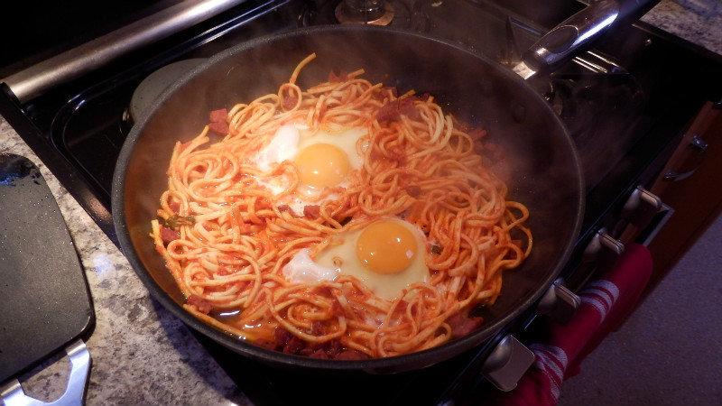 Eggs and ‘doggy bag’ pasta breakfast.