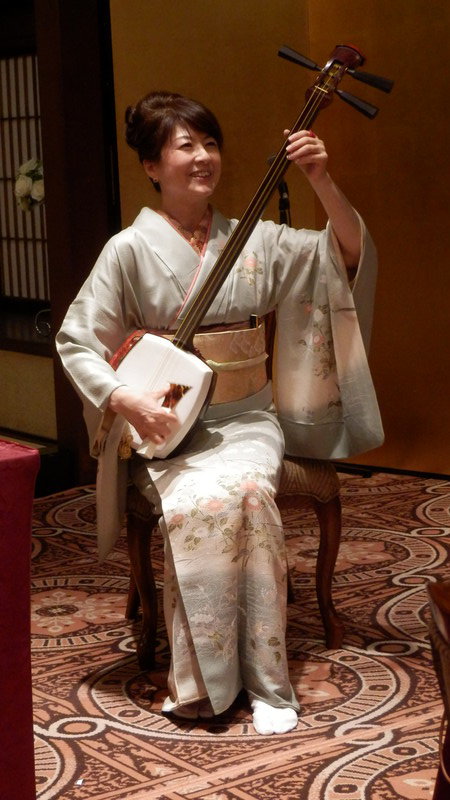Kanoko's aunt playing the Japanese lute.
