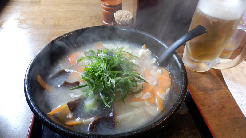 A steaming bowl of udon noodles for lunch.