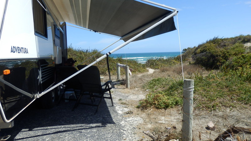 With the awning tied down to a fence we had shade to go with the view
