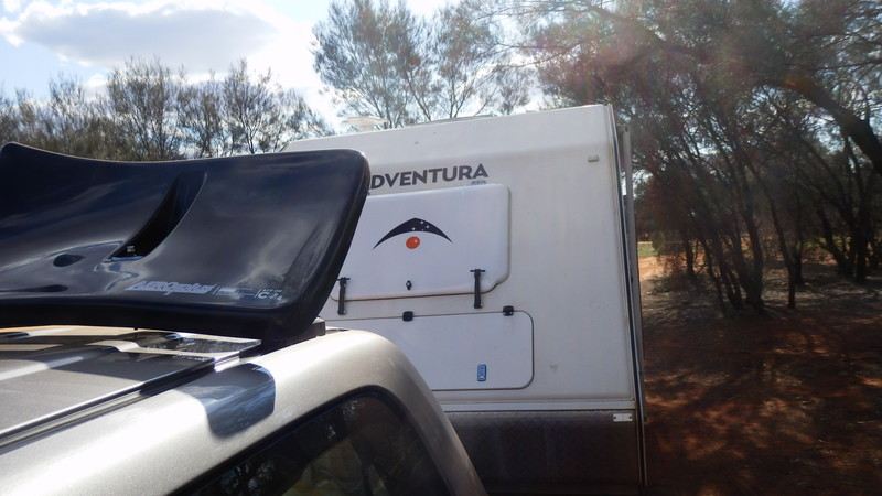 The wind deflector on the 4WD throws the airflow over the caravan saving 10 % in fuel use.  However it creates a negative pressure zone that necessitated the new clips on the stone guard.