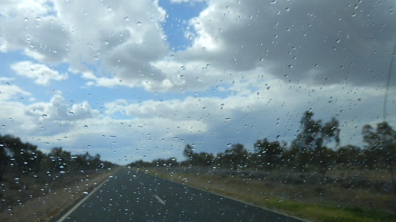 Just enough warm rain fell to clean the bugs off the windscreen on the outskirts of Bourke.