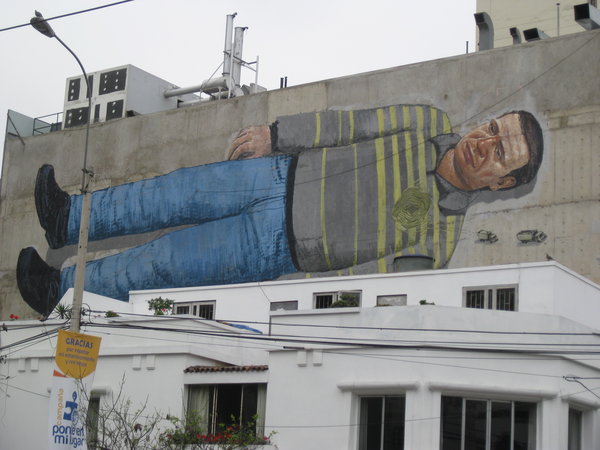 Mural political cartoon downtown Lima