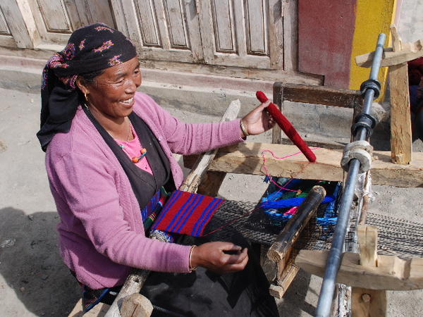 Tibetan woman weaving