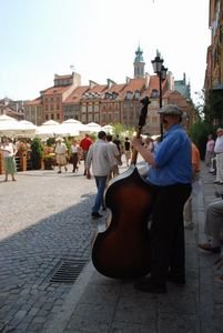 Bass player in the town square, Warsaw