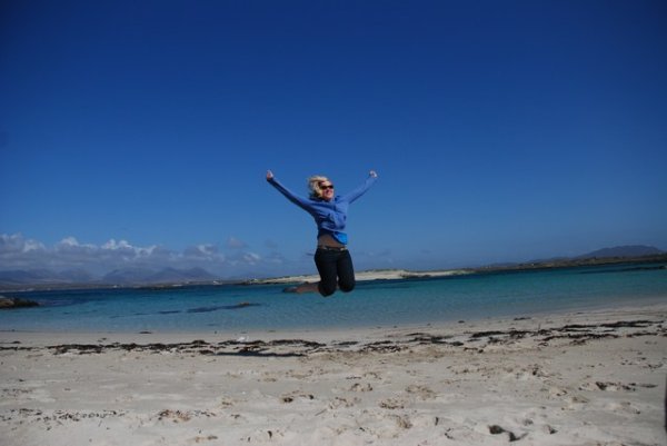 Renee jumping for joy at the Irish sun