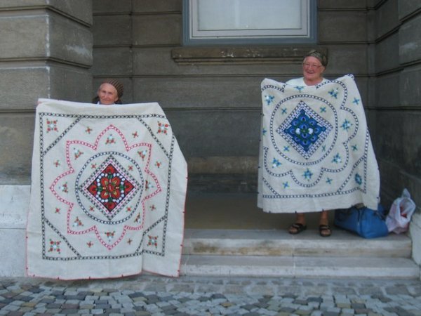 Enterprising local ladies with embroidery for sale at the Castle