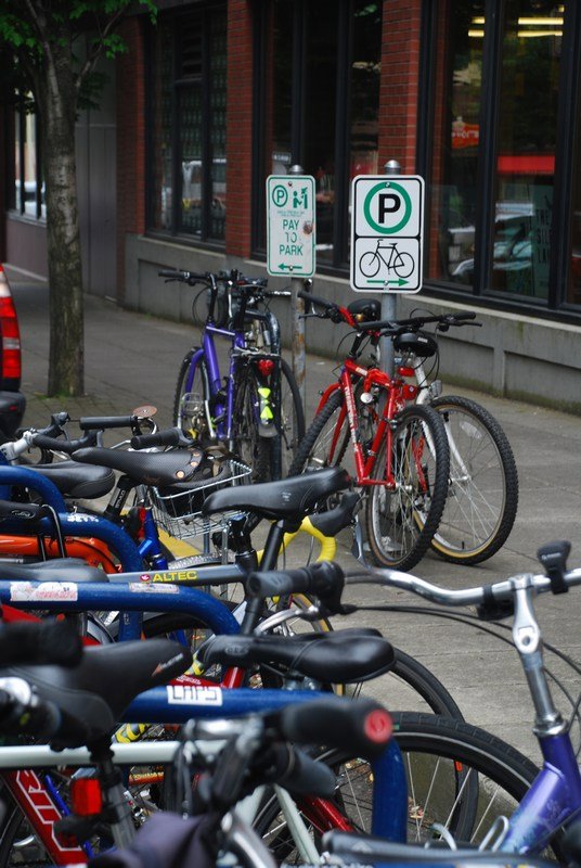 Pay car parking, free bike parking