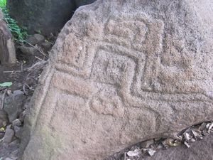 Petroglyph.  Looks a bit space invaders