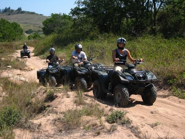 Britt, Craig, and I riding Quads near Durban