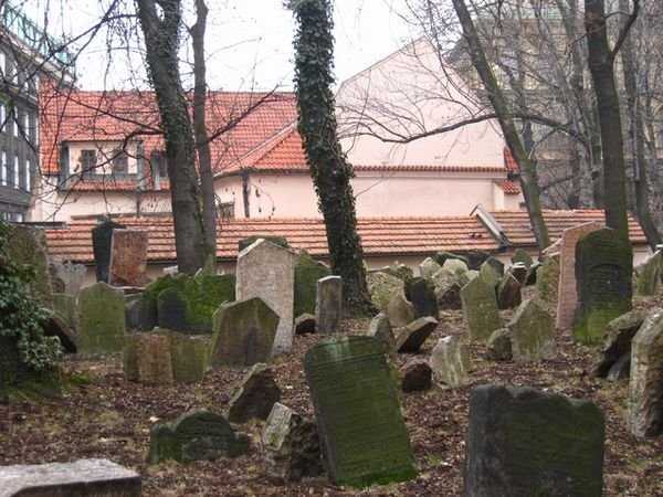 The Old Jewish Cemetery with the Pinkas Synagogue in the background.