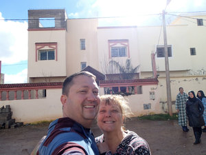 Clay and Ann in front of our new home.