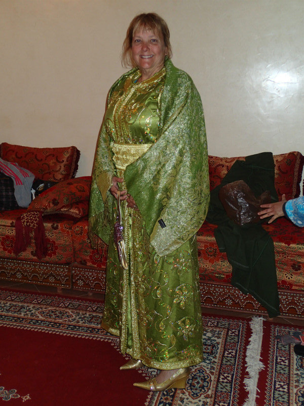 Ann being dressed up in Caftan.