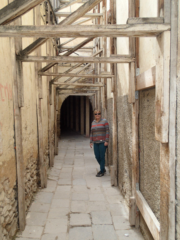 Ann in a cool walkway in the medina.
