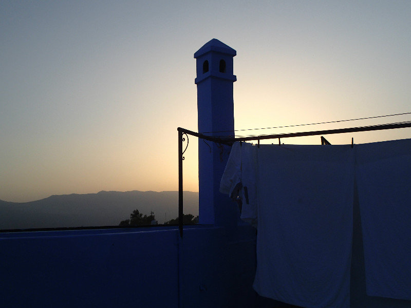 The sun setting and laundry drying.