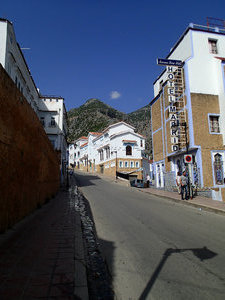 This road is on the outside of the medina and the wall on the left is the medina wall.