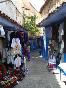Typical lane in the medina... complete with wares.