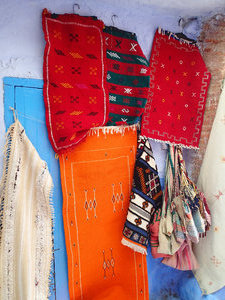 Some goods hanging up on a wall... I just loved the colors!