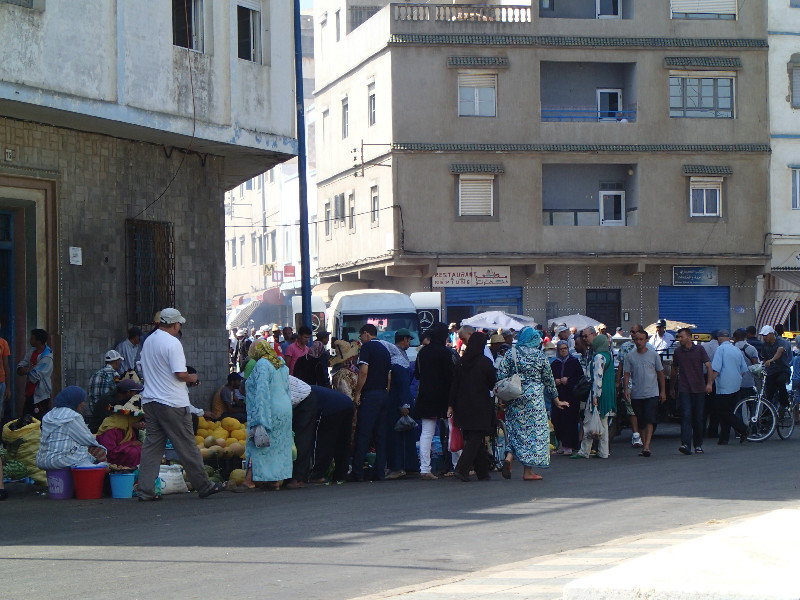 Just down the road, market time in Larache.