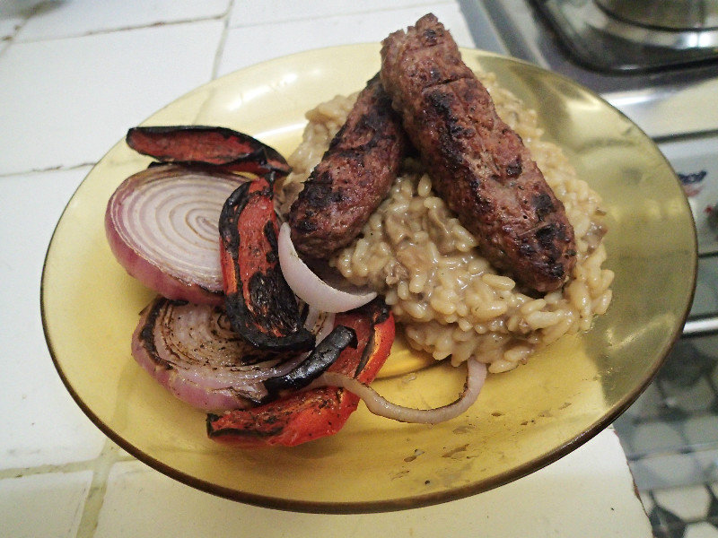 Kefta (spiced ground beef) grilled peppers and onions and mushroom risotto!  Minus the damage from smoke inhalation, an epic win!