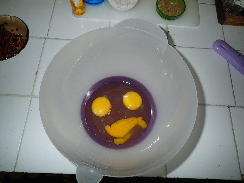 Now the everyone knows that I play with my food, I must state that I did NOT plan this smiley face!!!  I just cracked some eggs into a bowl and they smiled at me and asked me to photograph them.  I was happy to oblige.