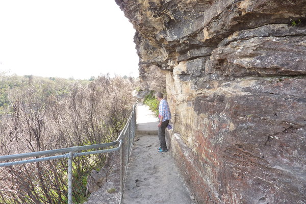 Kate avoiding Lizard on cliffside walk