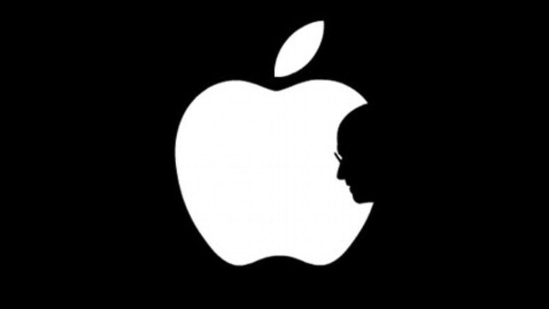 Apple Logo with a silhouette of Steve Jobs cut out replacing the trademark bite
