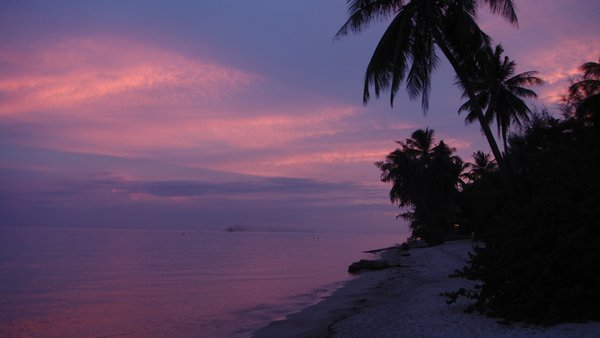 Sunset - coco gardens beach resort