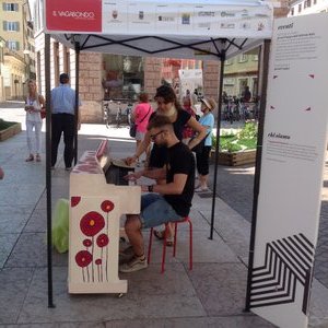 Pianos are placed out on the sidewalks in Trento to get people outside and mixing