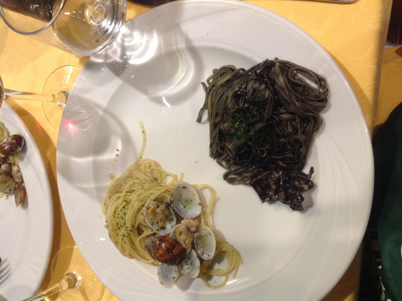 Pasta with clam sauce and squid in ink