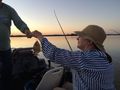 Piranha fishing at sunset