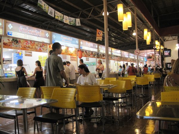 Food stalls at the yellow tables