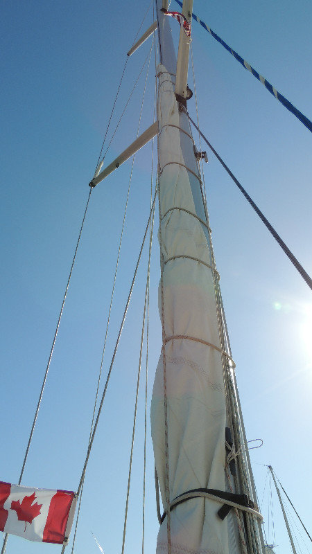 sail wrapped around the mast