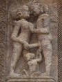 Erotic carvings....at a holy temple....she's a lucky lady!