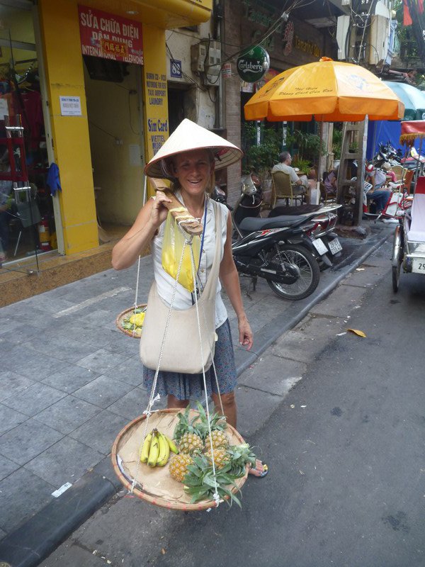 Carol trying out the street vendor's kit
