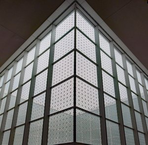 Symmetrically etched glass walls